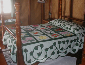 Flower Quilt on Four-Poster Bed